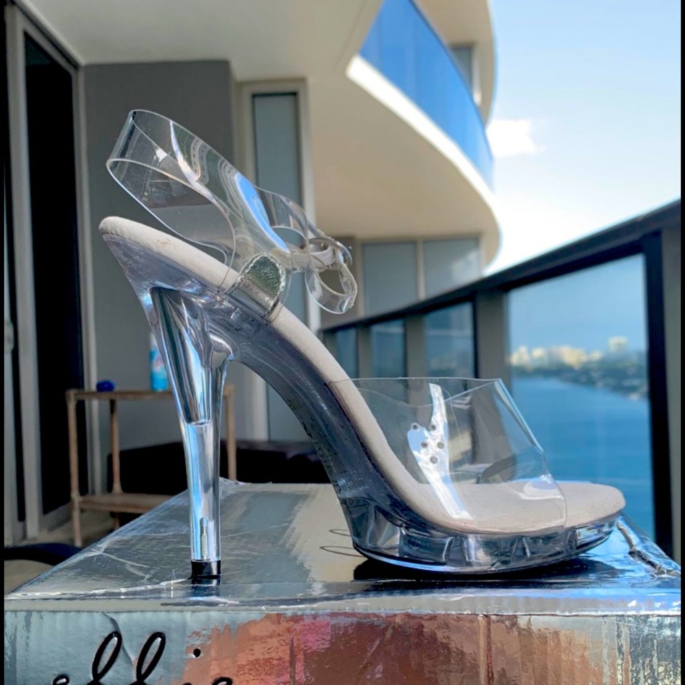 Bikini competitor or exotic dancer clear heels.